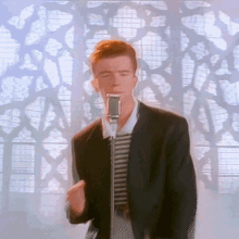 RickRoll GIF {Your Organization Doesn't Allow Viewing of Public or External Images}  